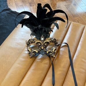 Elegant Black and Gold Masquerade Mask
